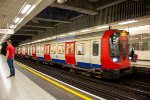 A District Line train arrives at Blackfriars